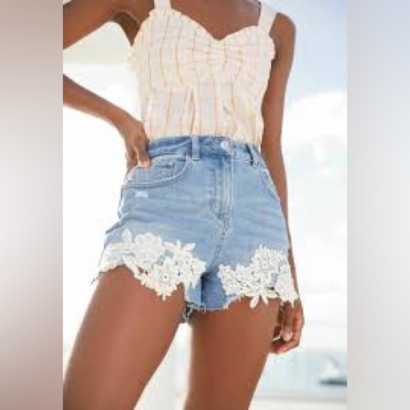 Hollister Pants - High-Rise Light Blue Denim Shorts with White Lace Trim Hollister Size 24/0